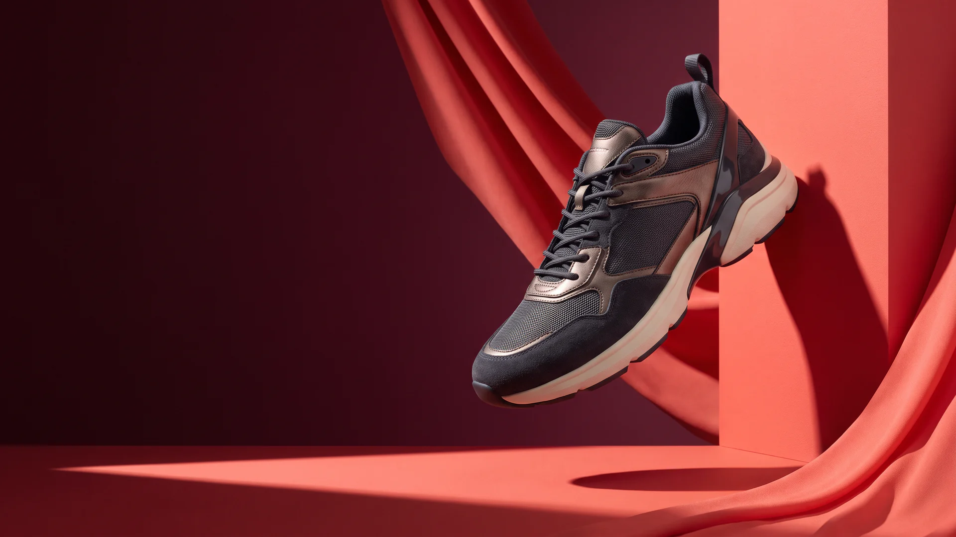 Sculptural running shoe presented as a bold advertising concept.